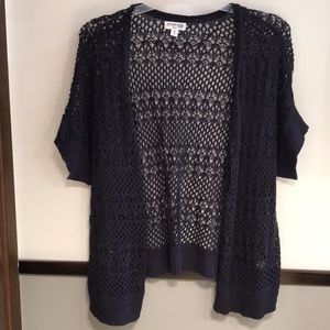 Open weave short sleeved cardigan.